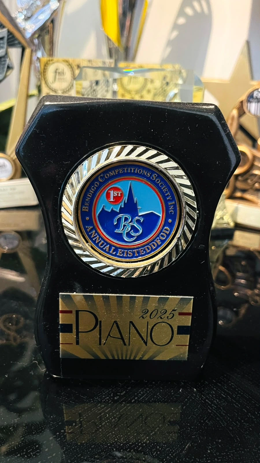 Isaac with a Bendigo piano award